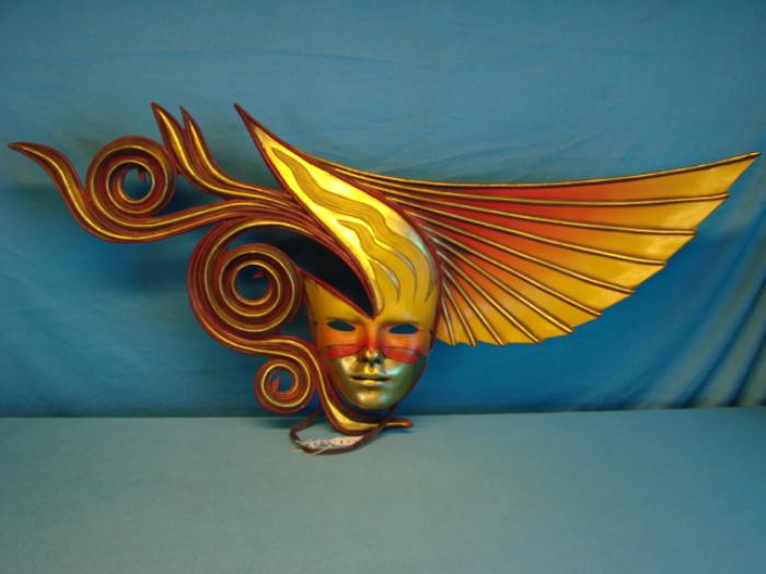 Extremely unique Kallula masquerade mask, made by Michael Taylor; Durable polyresin construction, all hand-painted. Mask is in great condition, has very light wear, a few chips and scratches in paint. Piece measures 37 1/2" wide, and 17 1/2" tall.