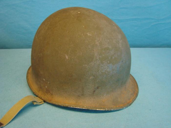 Very nice metal military combat helmet; Unsure of branch or year. Very nice army green color. Has some light rusting/oxidation along edges, one small crack along the seam, outside has a rough, bumpy finish. Please see pictures.