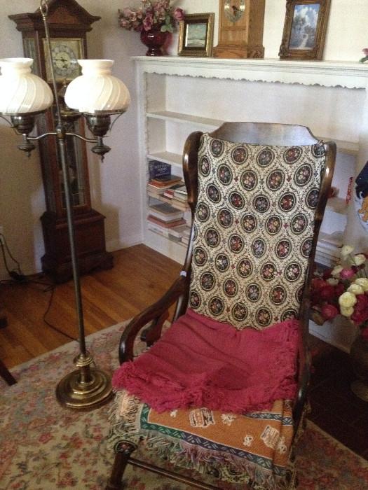 Antique chair and lighting and grandfather clock