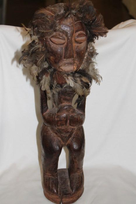 From Central Africa, village made - over 100 years old.  This figure represents fertility.  Hand carved and authenticated by the chisel marks and clear hand working