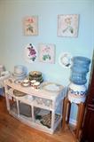 Wicker side console table and dishes