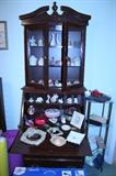 Secretary hutch with Lenox collectibles and other home decor pieces