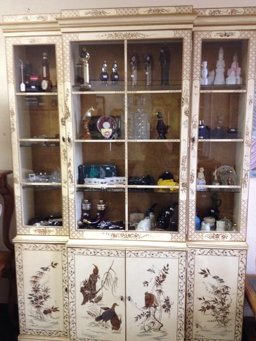 Oriental Hutch with Various Avon Collectible Bottles