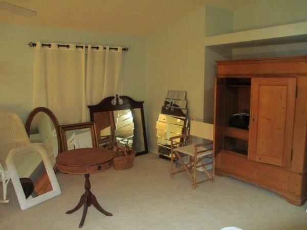 5 Quality mirrors, wicker rocker & solid wood entertainment center which may also be used as an armoir for hanging clthes and storing shoes, etc.