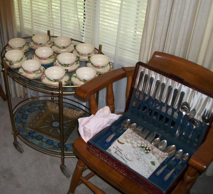 Brass Glass Top Tea Cart with Franciscan Desert Rose Cups and Saucers along with one of four sets of Silverware