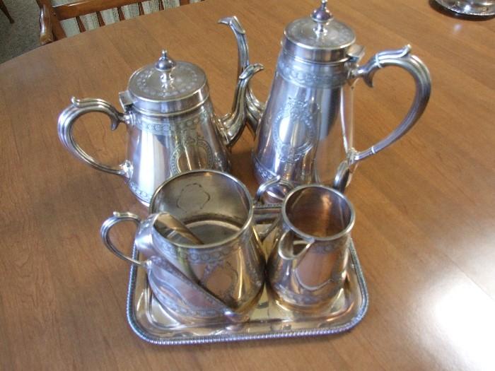 ANTIQUE QUAD SILVERPLATE ELEGANT SERVING SET.