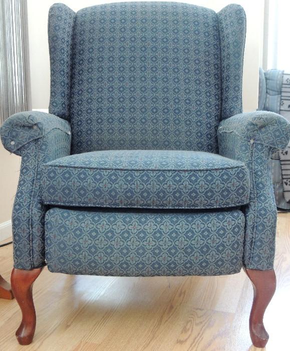 Wing chair; blue upholstery.