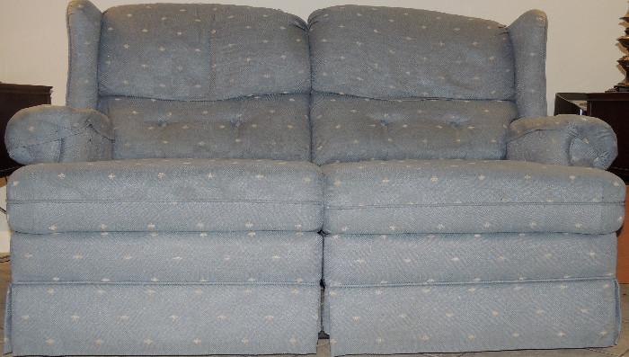 One of a pair recliner sofas.