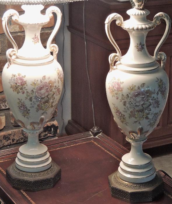 Pair of porcelain vase type floral lamps, with hand-painted enamel work.
