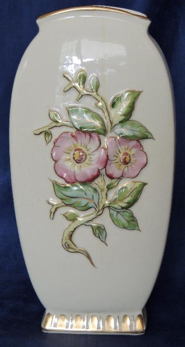Porcelain vase with wild rose decor.