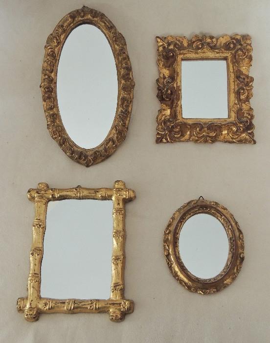 Group of small gilt decorative mirrors.