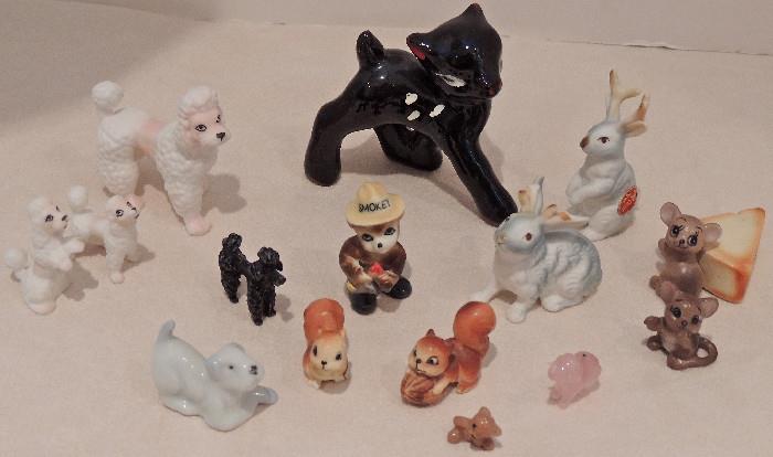 Ceramic animal miniatures-poodles, squirrels, cat, mice, Smoky the Bear.