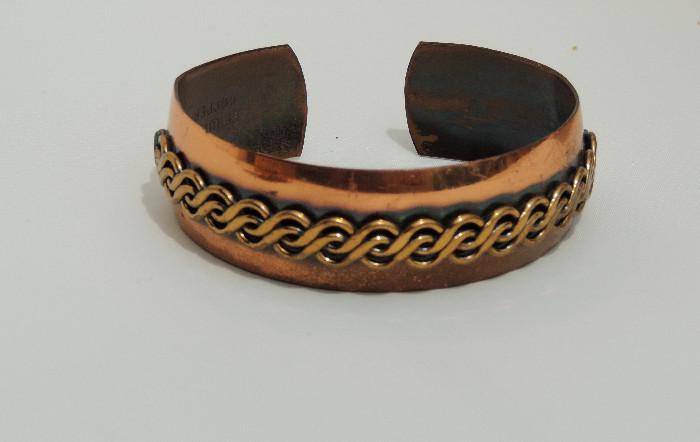 Copper bracelet.