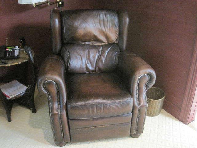 Worn in leather recliner