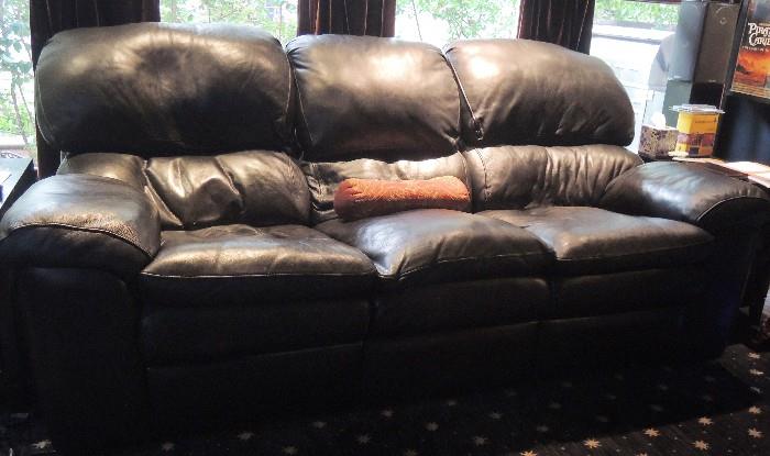 Leather Center, black leather reclining sofa