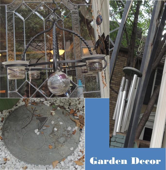 Garden decor.  Candle chandelier, wind chimes, shephard hooks, sun dial