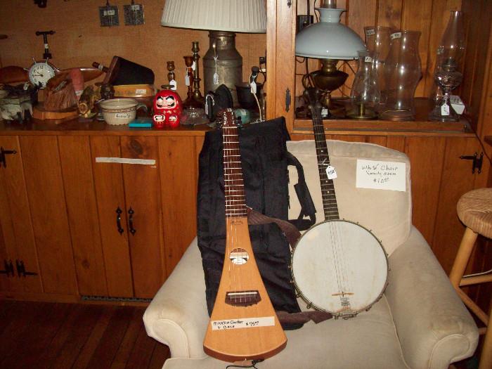 Martin backpacker Guitar and Vintage Banjo.