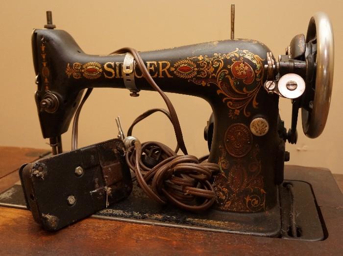 Antique Singer sewing machine and cabinet
