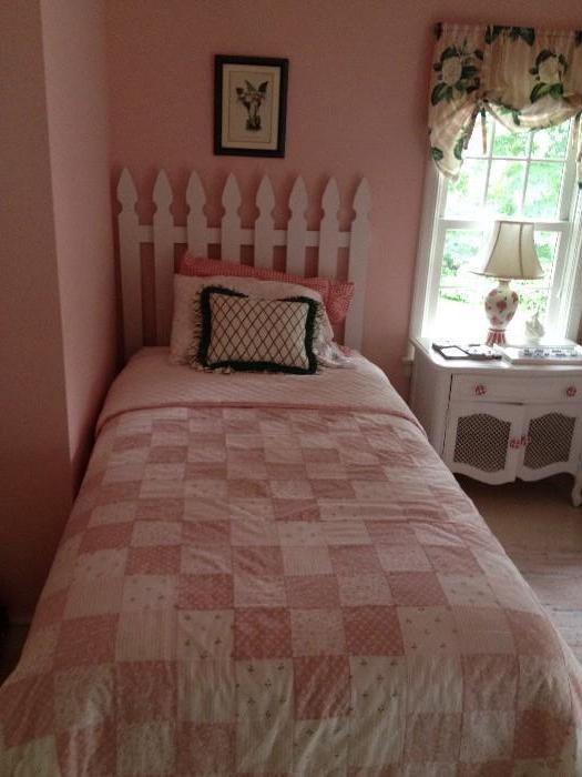 two twin beds with headboards