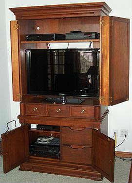 Entertainment center fits 42" flat screen TV or add a shelf to make a great armoire. (TV and components NOT included)