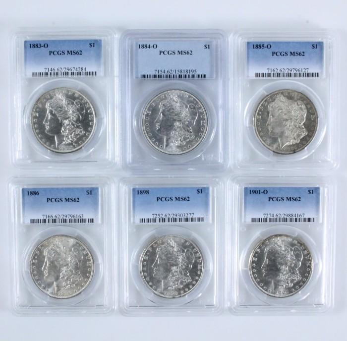 TIMES THE MONEY: Investor's lot of 6 different pre-1921 certified uncirculated U.S. Morgan silver dollars from 1883-1901 authenticated & graded MS62 by PCGS (the Professional Coin Grading Service). Please preview for dates. Times the money: bid per piece.