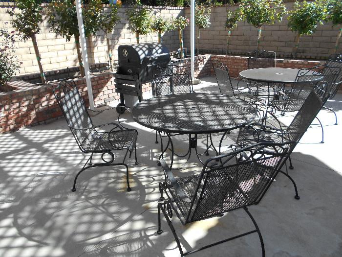 Pair wrought iron Patio Tables and Charcoal grill 