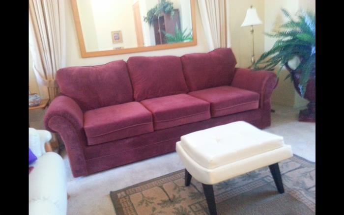 Like New Wine Colored Velvet Couch. Hardly used.