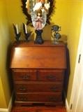 Fold down front secretary in solid wood, metal candlesticks, metal fish, angel and mirror