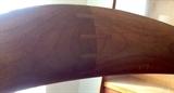 Close up of top of teak dining chair  marked JCA Jensen