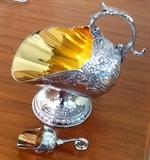 Pretty silver sugar skuttle with scoop!