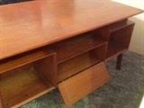 Front view of the lovely  vintage model 75 mid century modern Omann Jun Danish Teak desk