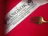 Label from inside large wooden serving box with 150 piece flatware set from Bangkok brass and wood - Siam pattern.  
