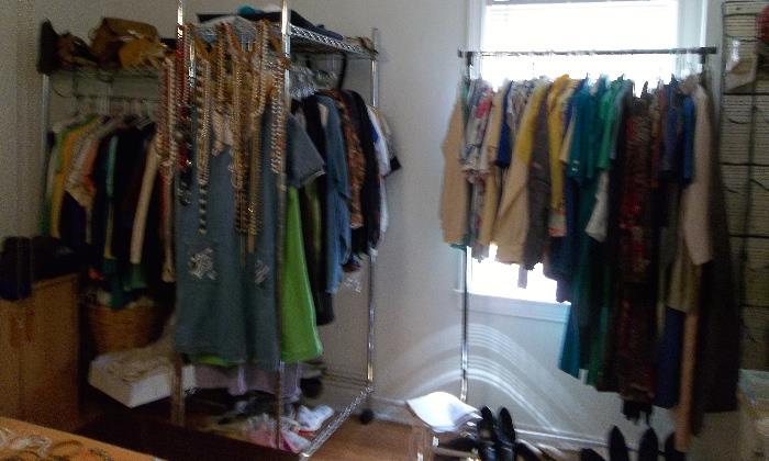 Further sampling of wardrobe racks of clothing  - sized, organized for easy shopping!