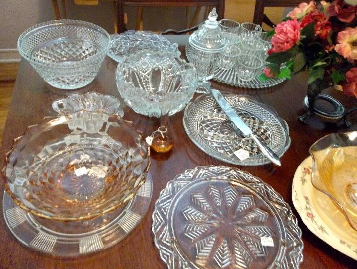 A few of the collectable crystal, pressed glass and elegant glass serving pieces.  Very nice cake knife with sterling handle!