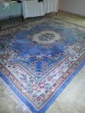 100%  wool carved chinese motif, room size rug.