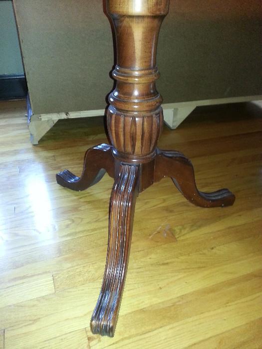 Pedestal legs of the dining room table.