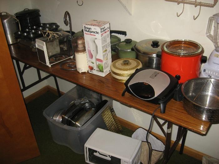 Pots and pans along with electric kitchen items