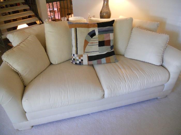 One of a pair of clean contemporary sofas