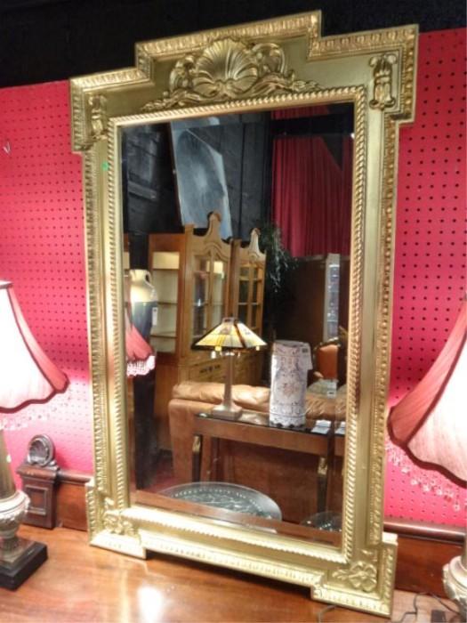 GOLD FINISH WALL MIRROR, CLASSICAL MOTIF WITH SHELL CREST