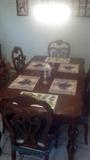 Liberty  Dining room set, expandable table w/six dining chairs. easily made smaller with removal of center leaf.