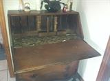 Antique writing  Desk, secret hiding spaces, large drawers and fold down writing area.