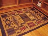 Small SW design area rug