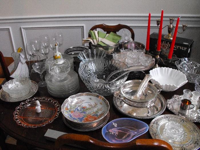 serving bowls,plates.silver candlabras