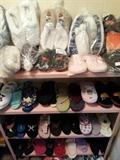 LOTS of brand new slippers on the top shelf and gently used shoes below ;)