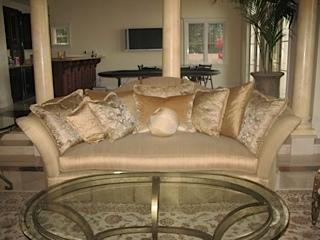 Marge Carson sofa, coffee table and rug available.