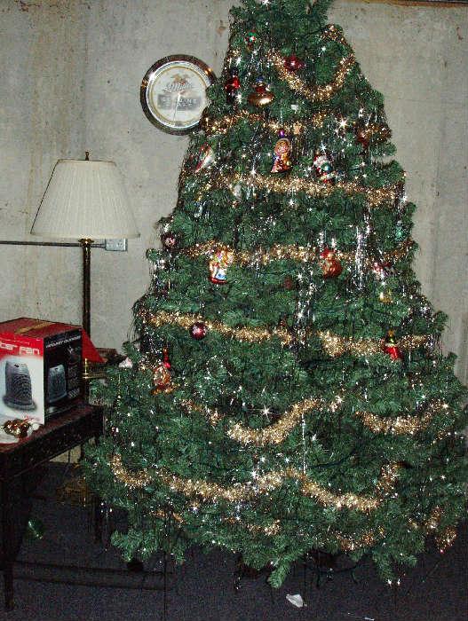 8' tall Christmas tree with figurial ornaments