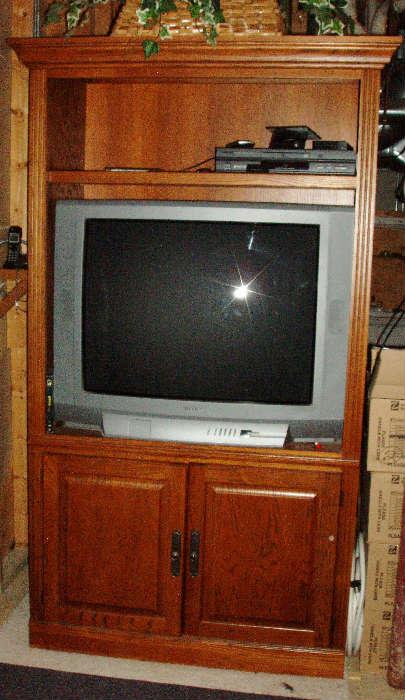oak TV cabinet and TV