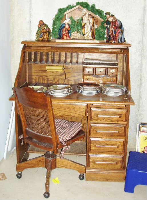 roll top desk and office chair (sold sepeaatly). Nativity set and collector plates