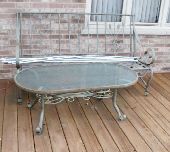 nice heavy large outdoor bench with matching coffee table, needs a paint job