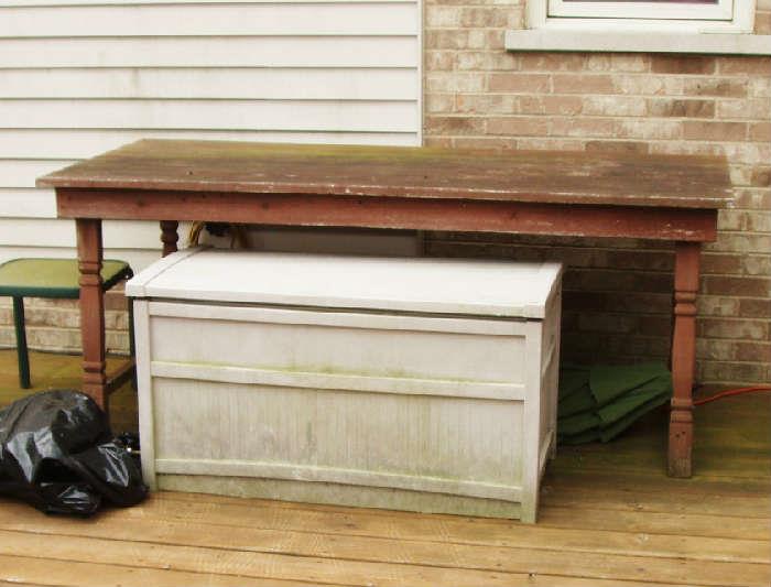 rubbermaid storage box and wooden serving table